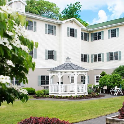 Exterior view of the facility with gazebo and garden