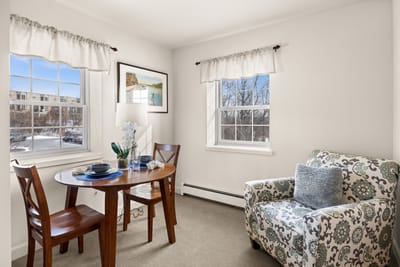 Bright interior of a resident unit with dining area