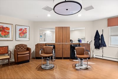 Interior of a salon with styling chairs and mirrors