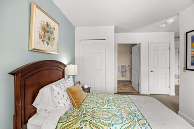 Cozy interior of a resident bedroom with bright decor