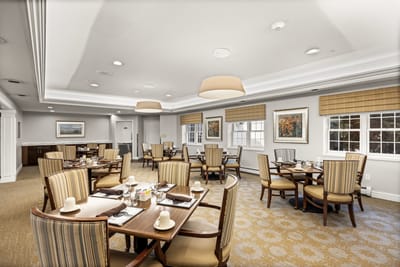 Bright dining room with neatly arranged tables and chairs