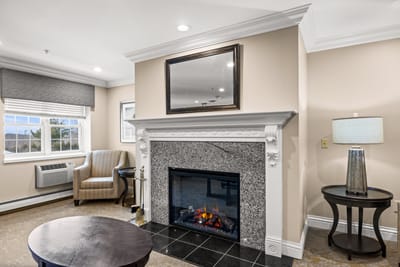 Cozy common area with a fireplace and seating