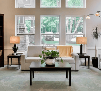 Bright common area with seating and natural light