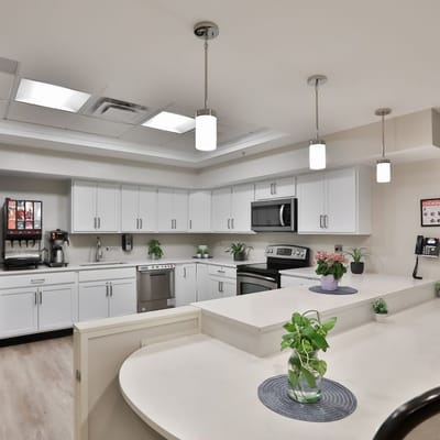 Light and modern kitchen area with appliances