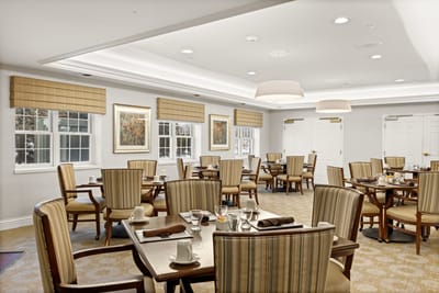 Dining area with tables set for a meal
