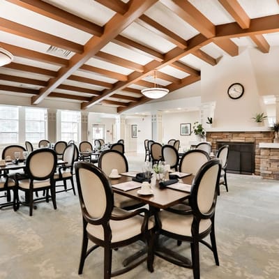 Bright dining room with tables and chairs