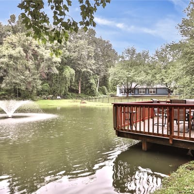 Scenic pond and deck area at the facility
