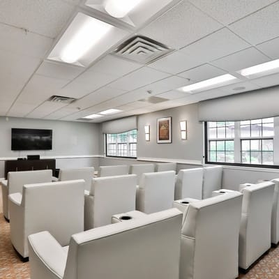 Interior common area with seating and TV