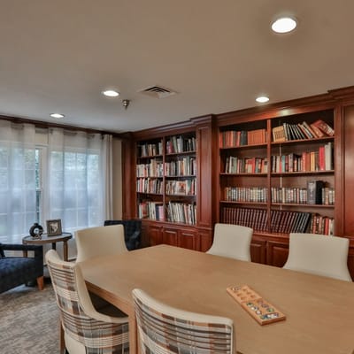 Bright interior view of a common area with bookshelves