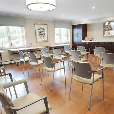 Bright common area with chairs arranged for an event