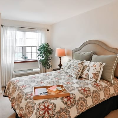 Cozy private bedroom in a senior living facility