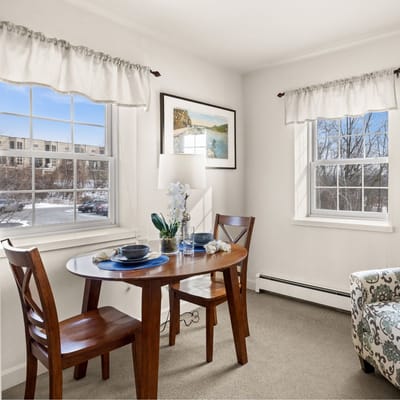 Cozy dining area in a senior living apartment