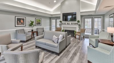 Bright common area with seating and artwork