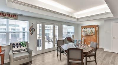 Common area with a puzzle game and seating