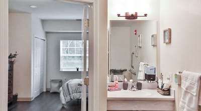 Interior view of a resident's room and bathroom