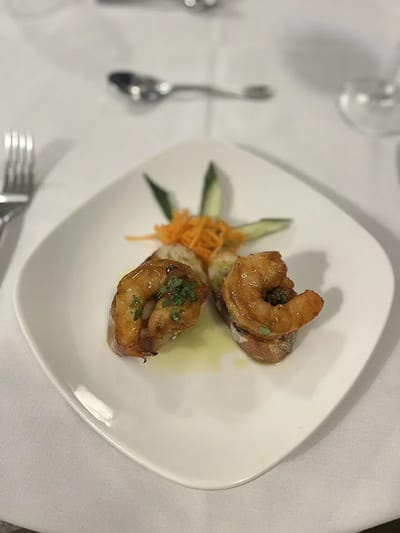 Plate of shrimp served on a white dish