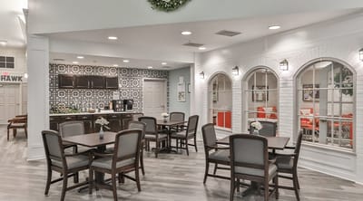 Interior view of a common area with dining tables