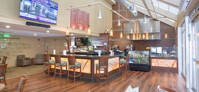 Interior view of a café area with seating and decor