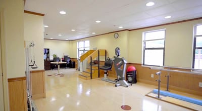 Interior view of a rehabilitation gym with equipment