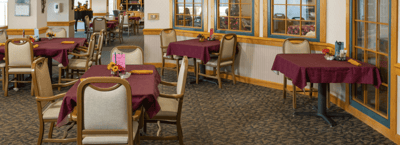 Dining area with tables set for meals
