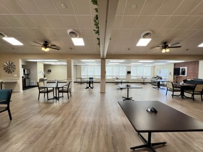 Bright common area with tables and seating