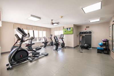 Interior view of a gym with exercise equipment
