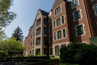 Exterior view of Otterbein Sunset House with gardens