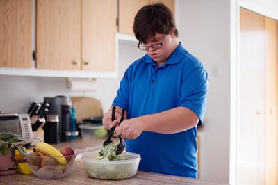 Young man preparing food in a kitchen