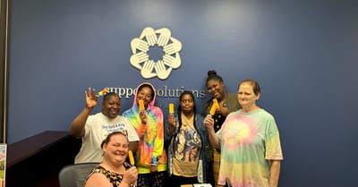 Staff and visitors engaging in a fun activity