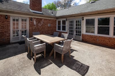 Outdoor patio area with seating.