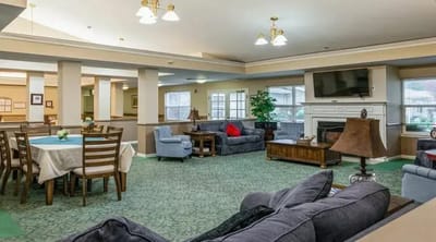 Cozy common area with seating and fireplace