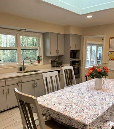 Bright kitchen area with a dining table