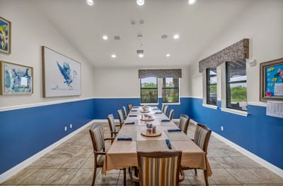 A dining room setup in a nursing home.