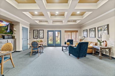 Bright common area with seating and artwork