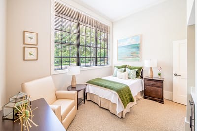 Cozy private room with a bed and seating area