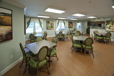 Bright dining room with tables and chairs