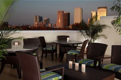 Outdoor seating area with a city skyline view