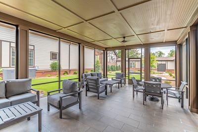 Indoor common area with seating and outdoor views