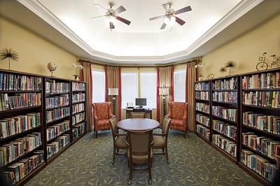 Bright library with bookshelves and seating area