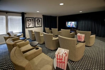 Cozy movie room with popcorn and comfortable seating