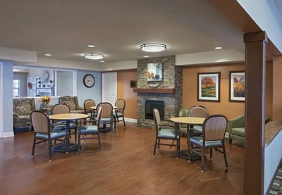 Bright interior common area with seating and artwork