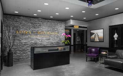 Modern lobby with reception area and seating