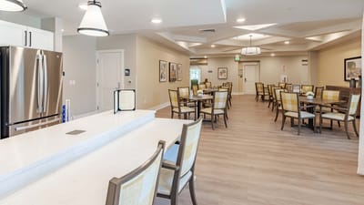 Bright dining area with tables and chairs