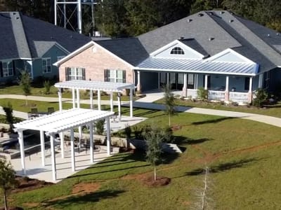 Aerial view of the facility's outdoor space and building.