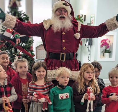 Santa with children at a holiday event