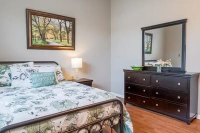 Cozy resident room with bed and decor