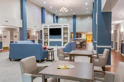 Bright common area with seating and decorations