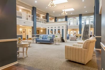 Bright common area with seating and decor