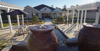 Outdoor area with fountains and seating