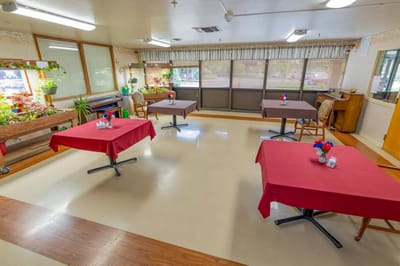 Common area with tables and decorations.